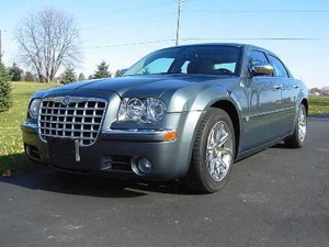 Task Force members own imports; Obama drives domestics, like this, his old Chrysler 300C.