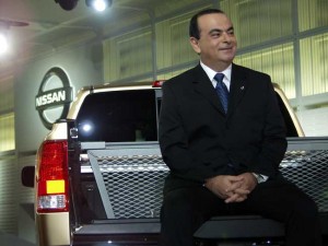 Better days: Nissan CEO Carlos Ghosn smiles as he debuts the original Titan pickup truck.