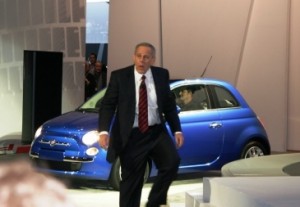 Former Chrysler Vice Chairman Jim Press shows off the Fiat 500, which will become a critical part of the "new" Chrysler line-up.