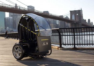 Looking a bit look a rickshaw, minus the coolie, the GM/Segway could revolutionize urban motoring.