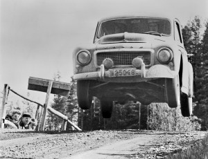 An airborne Gunnar Andersson in his PV during the 1958 Midnight Sun Rally, which he won. For marketing reasons Volvo retouched this photo, making a PV544 out of the 444 which Gunnar actually drove.