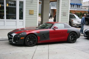 The thin disguise does little to hide the shape and dimensions of the 2011 Mercedes-Benz SLS.