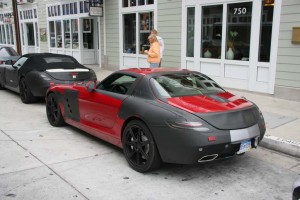 The 2011 Mercedes-Benz SLS is a sleeker, less over-the-top design than the poorly-received SLR.  But it carries over the predecessor's gullwing doors.