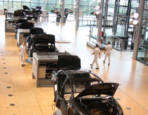 A good thing Volkswagen's Transparent Factory has soft Canadian maple floors.  Operating at a fraction of capacity, workers are quite "relaxed," says one manager.