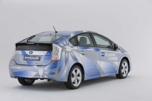 The 2011 Toyota Prius Plug-in will get about 14 miles on a fully-charged battery, at speeds up to 60 mph.