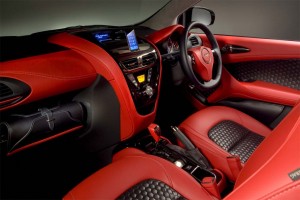 The contrasting black and red leather interior looks a bit more like a classic Aston Martin design.