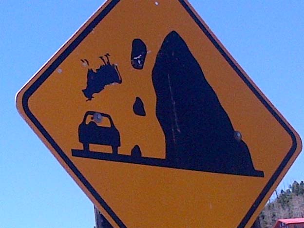 Falling Cows, Asteroid Crossings and Other Wacky Street Signs